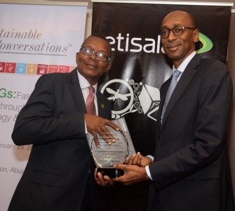 (R-L) Vice President, Regulatory & Corporate Affairs, Etisalat Nigeria, Ibrahim Dikko presenting a plaque to Prof. Labode Popoola, Director, Centre for Sustainable Development (CESDEV), University of Ibadan at the Sustainable Conversations thought leadership series sponsored by Etisalat Nigeria in Abuja on Thursday.