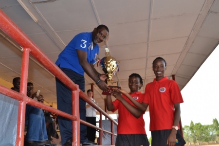 Red House Captain Adeniran Adedeji and Assistant Red House Captain Nwachukwu Chioma, receiving trophy from the Chairman Board Of Director, Prince Abimbola Olashore, on behalf of Red House, the winner of the Interhouse sports competition , at Olashore International School, Illoko-Ijesha, Osun State.