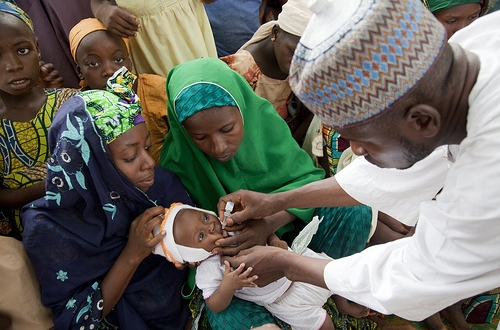 NIGERIA / Kano / 4 June 2010 Children receive Oral Polio Vaccine during the official flag-off of the polio campaign of the Gwale LGA at Tudunyola in the Kabuga locality of Kano city.