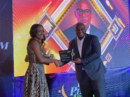 L-R- Chief Strategy Officer, Interswitch Group, Ndifreke Nkose (representing the Founder/Group Managing Director, Interswitch Group, Mitchell Elegbe), receiving the Fintech Ecosystem Leadership Award from Wole Oyeniran, Partner, Enterprise Technology & Performance Consulting (West Africa), Deloitte, at the Platinum Fintech Awards organised by the Fintech Association of Nigeria, in Lagos last Saturday.