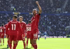 Liverpool edge Everton 2-1 as Van Dijk seals late derby win